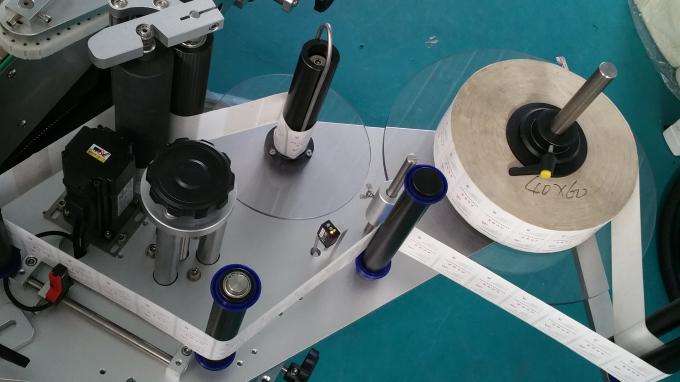 Ovālas somas un pudeles etiķešu uzlīmju uzklāšanas ierīce, pašlīmējošu etiķešu drukas mašīna ar garu konveijeru