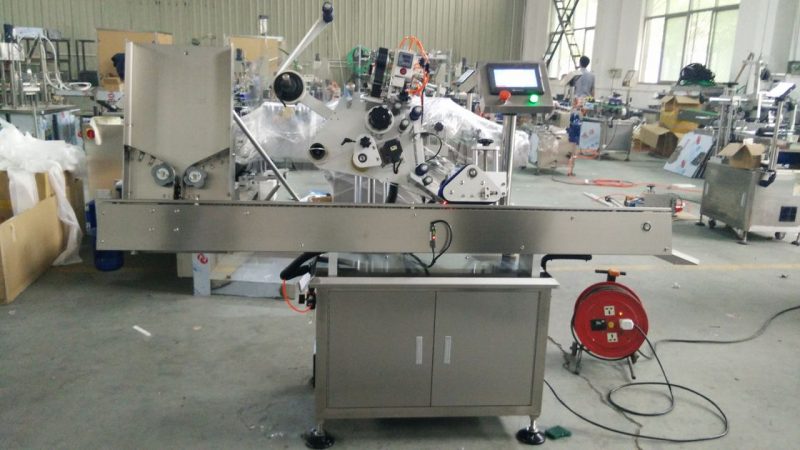 Ķīna Ātrgaitas mazas apaļas kārbu etiķešu līmēšanas mašīna, acu melnās pudeles etiķetes uzlīmju mašīna kosmētikas piegādātājam